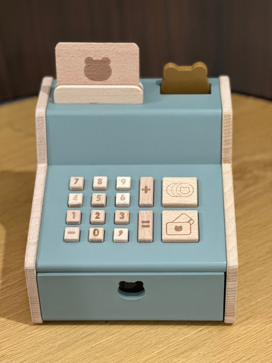 A wooden cash register