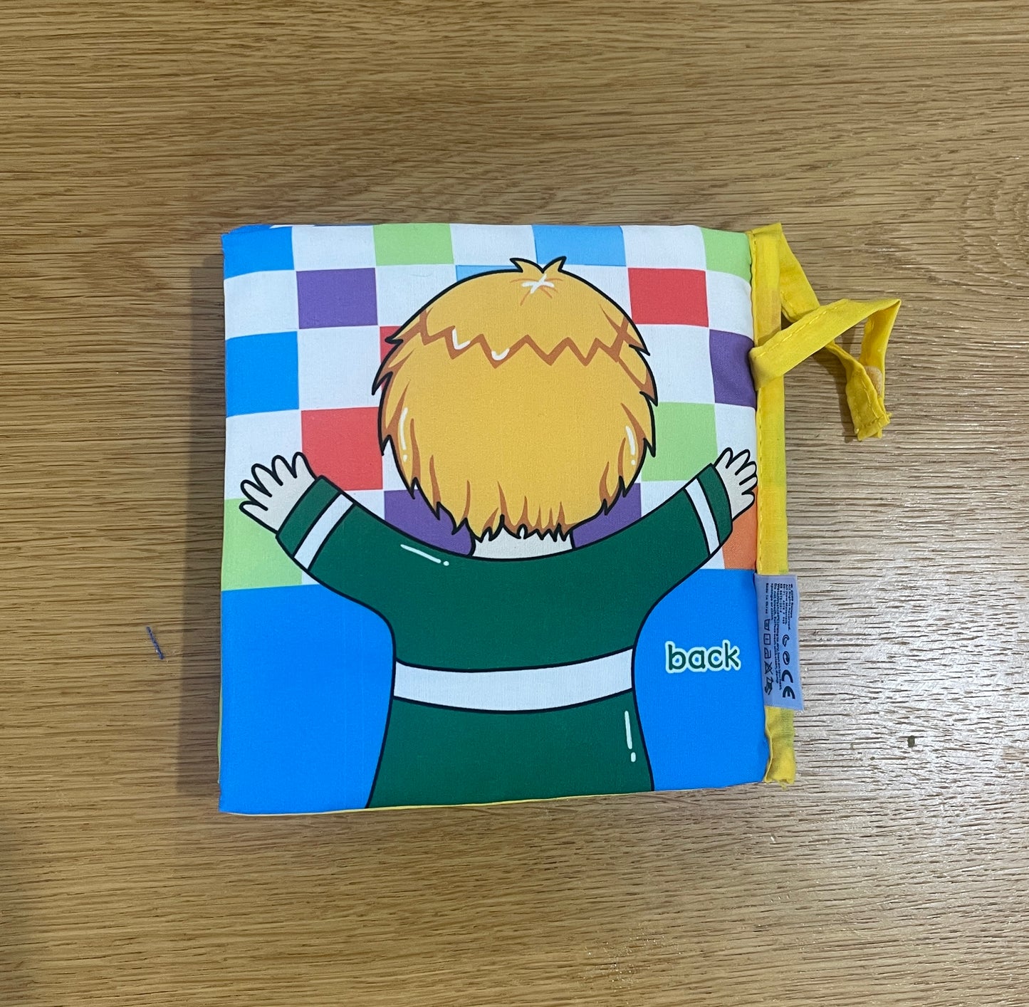 A soft book for a baby - learning parts in English