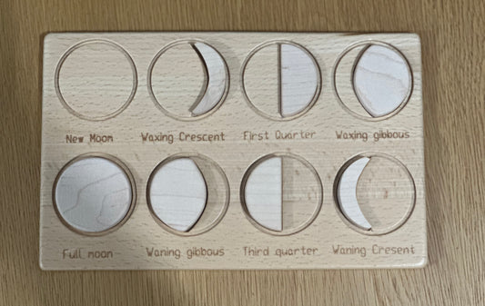 A wooden puzzle for a child - a moon puzzle 