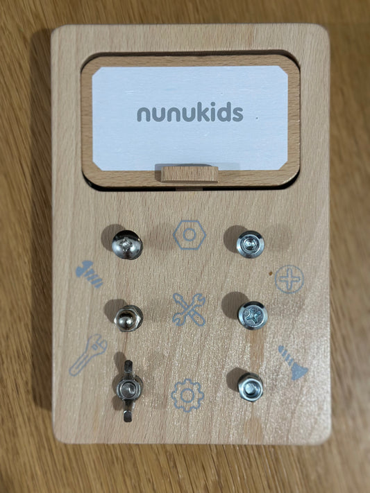 Screwing game for a child - a wooden screwing board