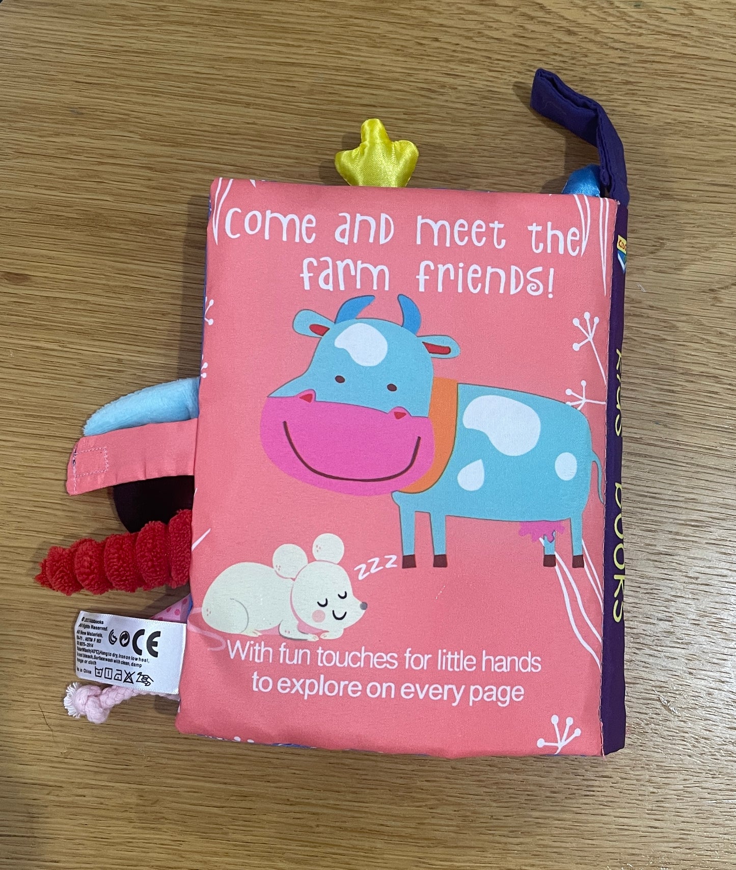 A soft book for a baby - fun on the farm